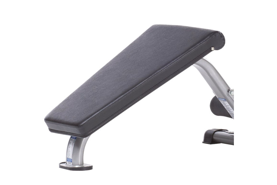 TuffStuff Mini Ab Bench with gray padded seat and silver metal frame on white background