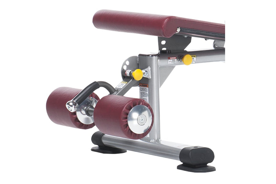 TuffStuff Proformance Multi Adjustable Bench with burgundy padding, gray steel frame, yellow adjustment knobs, and black feet