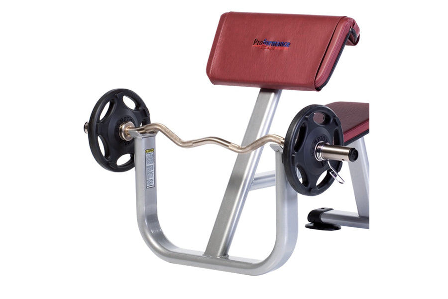 TuffStuff Proformance Plus preacher curl bench with burgundy padded seat, silver aluminum frame, and black weight plates on c