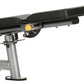 Black and gray functional trainer machine with adjustable arm attachment and yellow indicator dial on white background