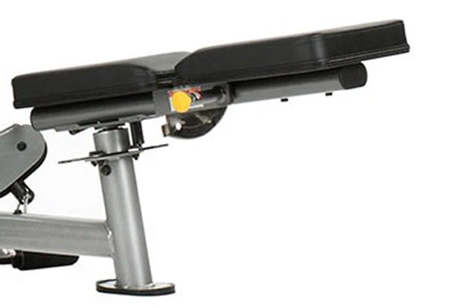 Black and gray functional trainer machine with adjustable arm attachment and yellow indicator dial on white background