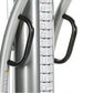 Silver functional trainer machine with black handles and measurement scale on center column, front view
