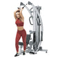Woman in burgundy sports bra and leggings using silver and black functional trainer machine with dual cables and handles