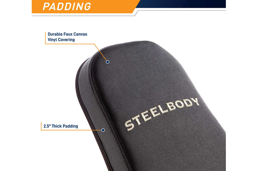 Charcoal gray padded utility bench with "Steelbody" text, showing durable faux canvas vinyl covering and 2.5-inch thick paddi