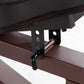 Black and brown metal mounting bracket with adjustment holes, attached to brown steel frame of weight bench