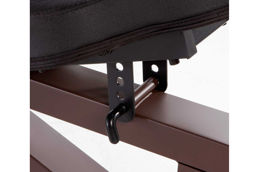Black and brown metal mounting bracket with adjustment holes, attached to brown steel frame of weight bench