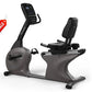 Vision R60 recumbent exercise bike with black digital console, padded seat, and foot pedals on white background