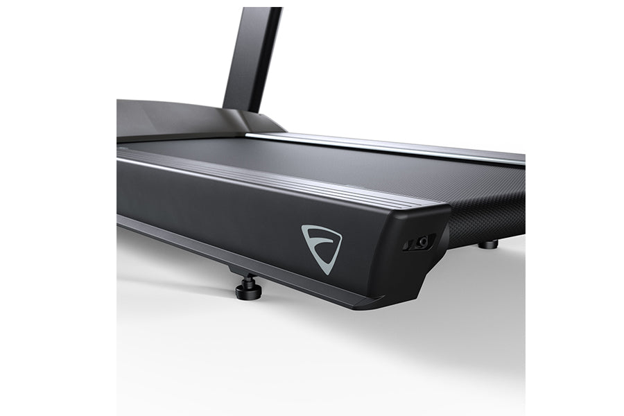 Black and gray light commercial treadmill with upright post and textured running surface on white background