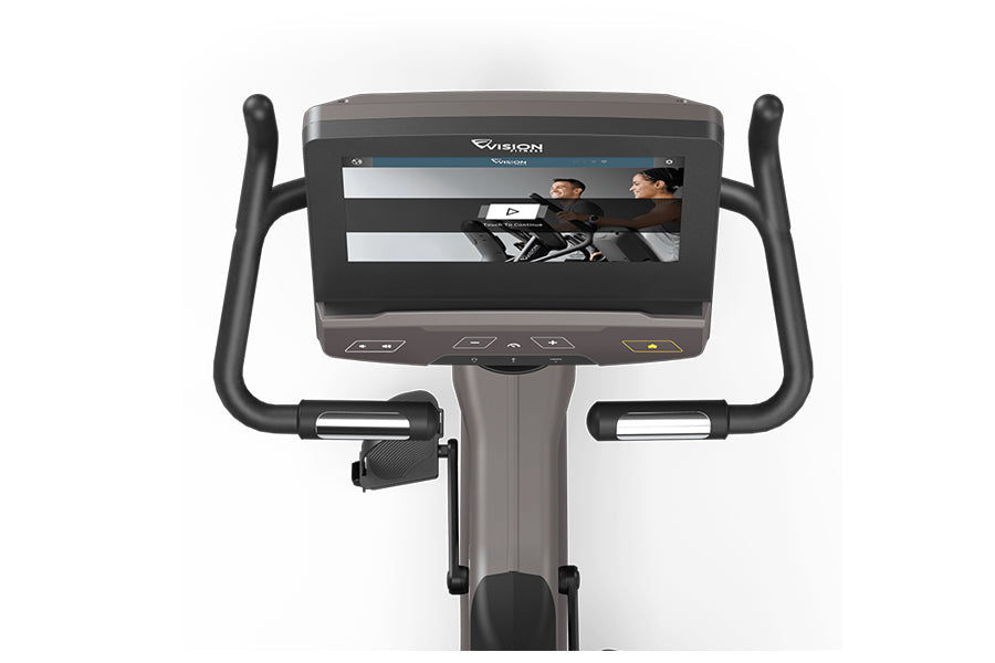 Vision U600E upright exercise bike with black handles, digital display screen, and gray pedal base on white background