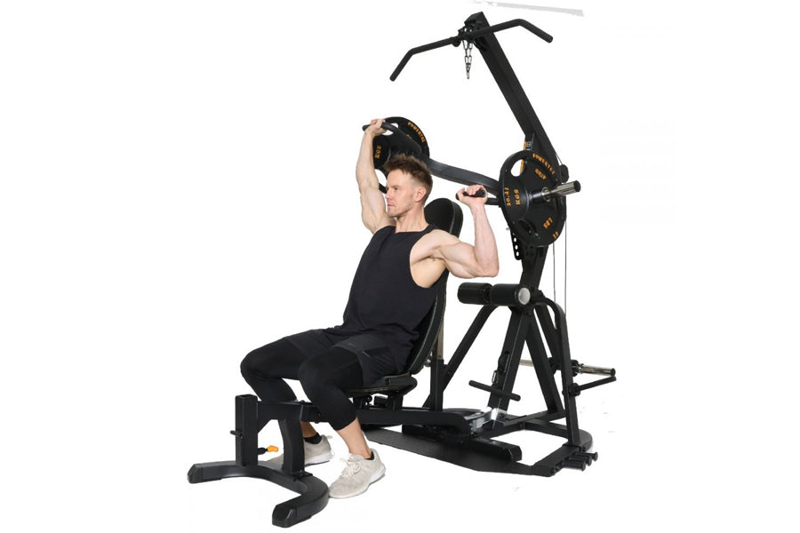 Man using black Powertec Levergym strength training machine with weighted plate stack on white background