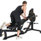 Man using black Powertec WorkBench MultiPress home gym equipment with weighted plate, shown from side angle on white backgrou
