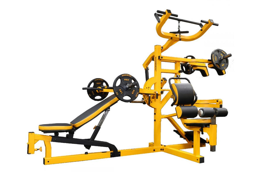 Yellow and black multi-station home gym with leg press, bench, cable machine, and weight plate storage on white background