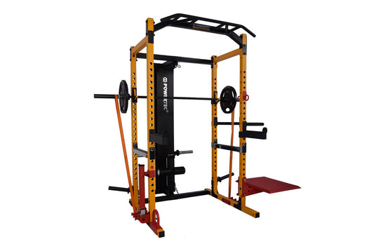 Yellow and black multi-function power rack with barbell holders, weight plates, and red footplate on white background