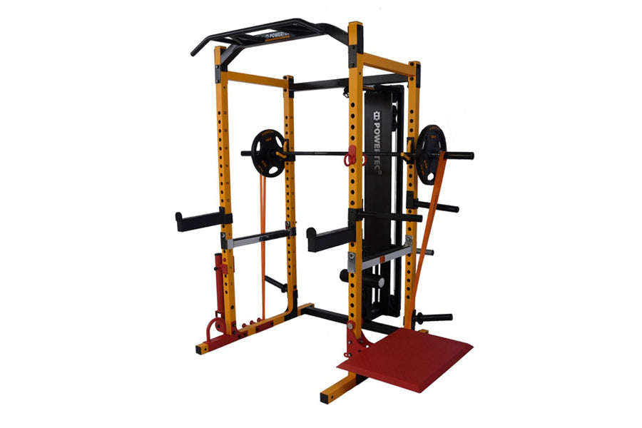 Gold and black power rack with cable machine, barbell holders, and red base platform on white background