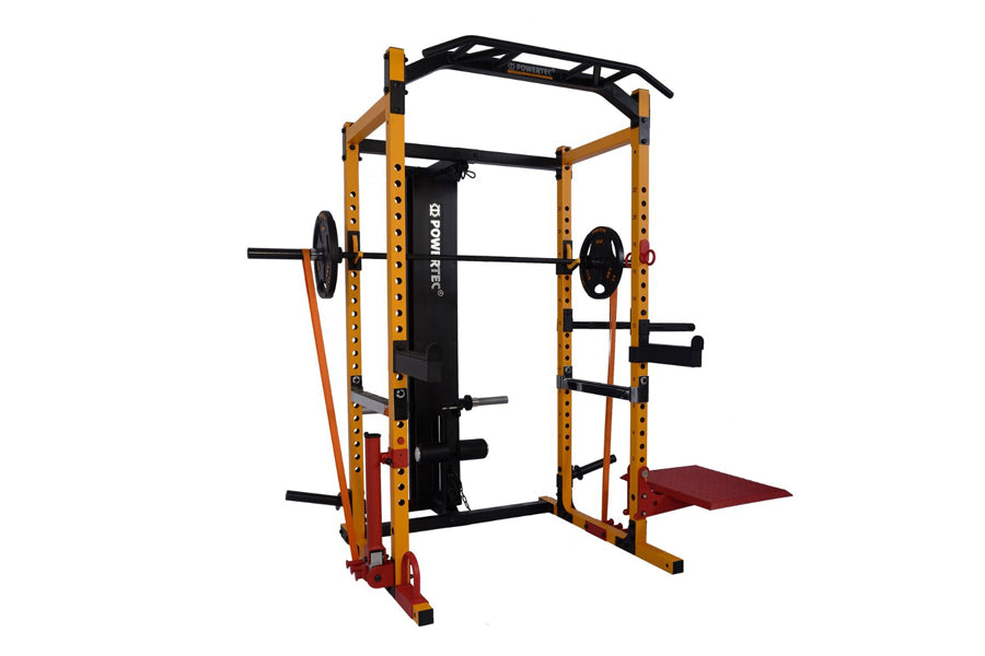 Powertec WorkBench Power Rack with yellow steel frame, black safety bars, red foot platform, and barbell pegs on white backgr