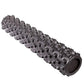 Black textured foam roller with pyramid-shaped knobs throughout, cylindrical shape on white background