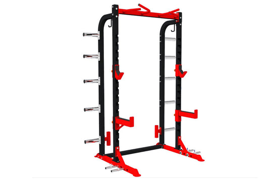 Black and red squat rack with adjustable safety bars, j-hooks, and dip attachment on white background