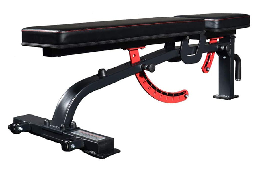 Black and red adjustable weight bench with padded seat, leg extension attachment, and incline mechanism on white background