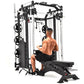 Black and white multi-function power rack with cable pulleys, weight stack system, and attached bench, shown with shirtless m