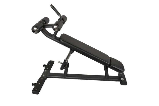 Black adjustable decline crunch weight bench with padded seat, leg extension footrest, and dual handle grips, on white backgr