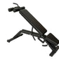 Black adjustable weight bench with decline position, padded backrest and seat, leg extension attachment, and anchored foot pl