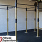 Warrior Commercial Pro Rig System with cream and black steel frame, black pull-up bars, and black rubber flooring in gym sett