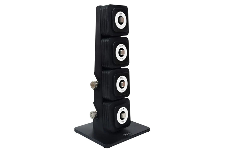 Black adjustable dumbbell tower with four stacked weights, white and silver trim accents, on flat base stand