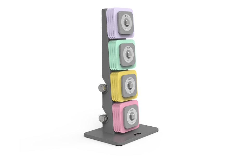 Warrior D22.5 adjustable dumbbell set with four interchangeable colored weights stacked on gray stand, purple, mint green, ye