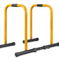 Warrior Equalizer Dip Bars with yellow steel frames and black rubber handles on white background