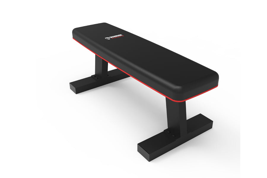 Black flat weight bench with red trim and padded seat, sturdy steel frame on white background