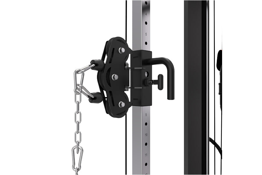 Black cable pulley attachment with metal chain, mounted on gray weight stack frame for functional trainer