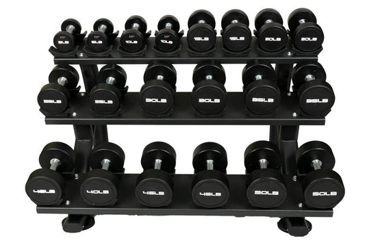 Three-tier black dumbbell rack holding 30 pairs of black dumbbells with white logos, on white background