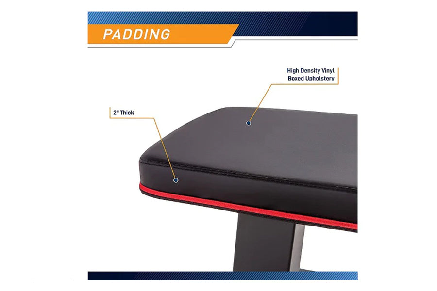 Warrior Flat Bench Pro with 2-inch thick high-density vinyl boxed upholstery and red trim, side view showing padding detail