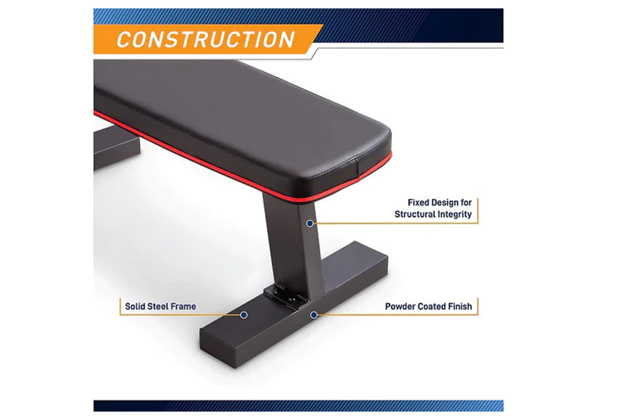 Warrior Flat Bench Pro with black padded seat, red trim, solid steel frame, and powder coated finish shown in construction di