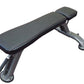 Black padded flat weight bench with adjustable headrest and sturdy metal frame on white background