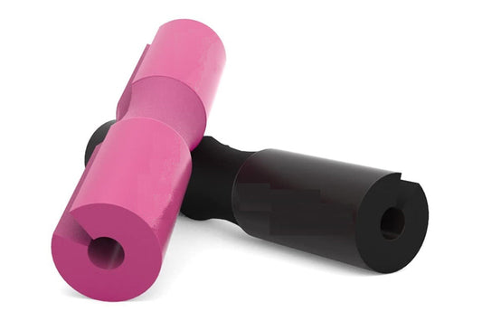 Pink and black foam squat pad with cylindrical cushioning and connector joint on white background