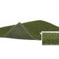 Green artificial turf roll with textured backing, shown flat lay on white background with close-up detail view