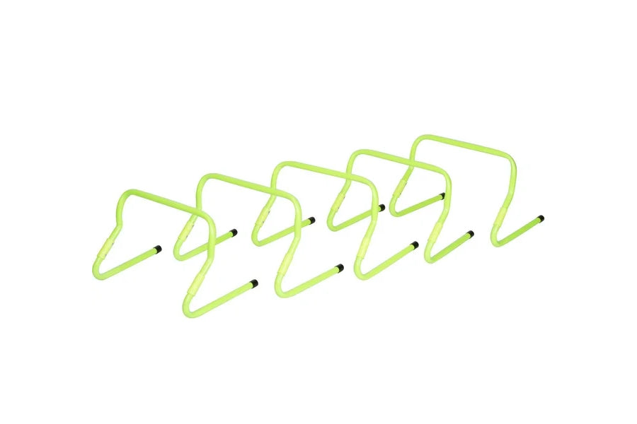Set of five neon yellow adjustable speed hurdles with black feet on white background