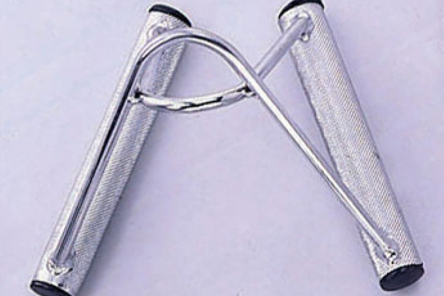 Silver metal seated row and chinning combo attachment with textured grips and black rubber end caps on lavender background