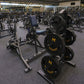 Warrior Interlocking Rubber Gym Flooring Tiles in speckled gray, installed in fitness facility with exercise equipment