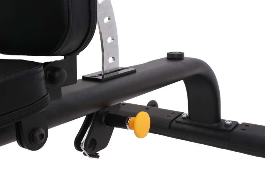 Black weight bench with curved handles, yellow foot pedal, and adjustable backrest on white background