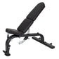 Adjustable weight bench with black padded backrest and seat, metal frame with leg extension, on white background