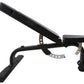 Black adjustable weight bench with angled backrest, leg extension, and padded seat on white background
