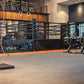 Warrior Marble Interlocking Tile Gym Flooring in cloud grey installed in crossfit gym with training equipment