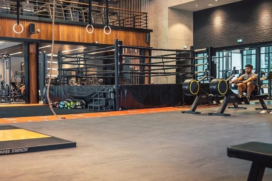 Warrior Marble Interlocking Tile Gym Flooring in cloud grey installed in crossfit gym with training equipment