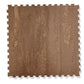 Brown wood-grain interlocking foam tile with puzzle-piece edges, flat lay on white background