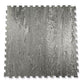 Gray interlocking foam gym tile with wood grain texture and puzzle-piece edges on white background