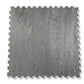Gray interlocking gym floor tile with wood grain texture and puzzle-piece edges on white background