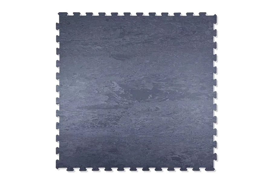 Dark blue-gray interlocking gym tile with textured surface and puzzle-piece edges, shown on white background