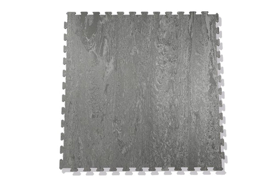 Warrior Marble Interlocking Gym Tile in smoke grey with wood grain texture and puzzle-piece edges, flat lay